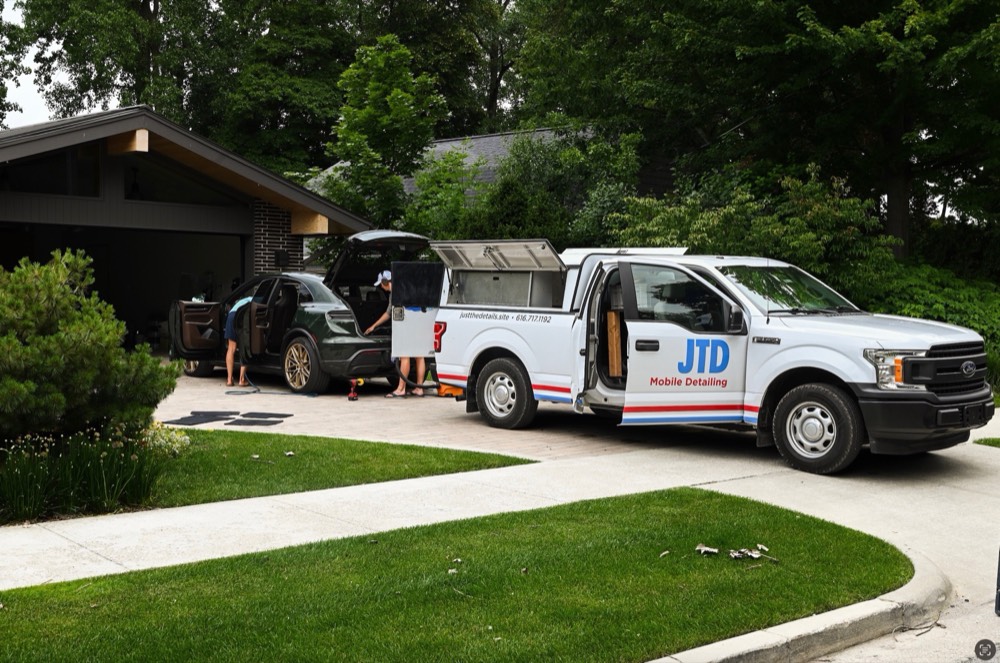 Just The Details mobile detailing truck and trailer on site
