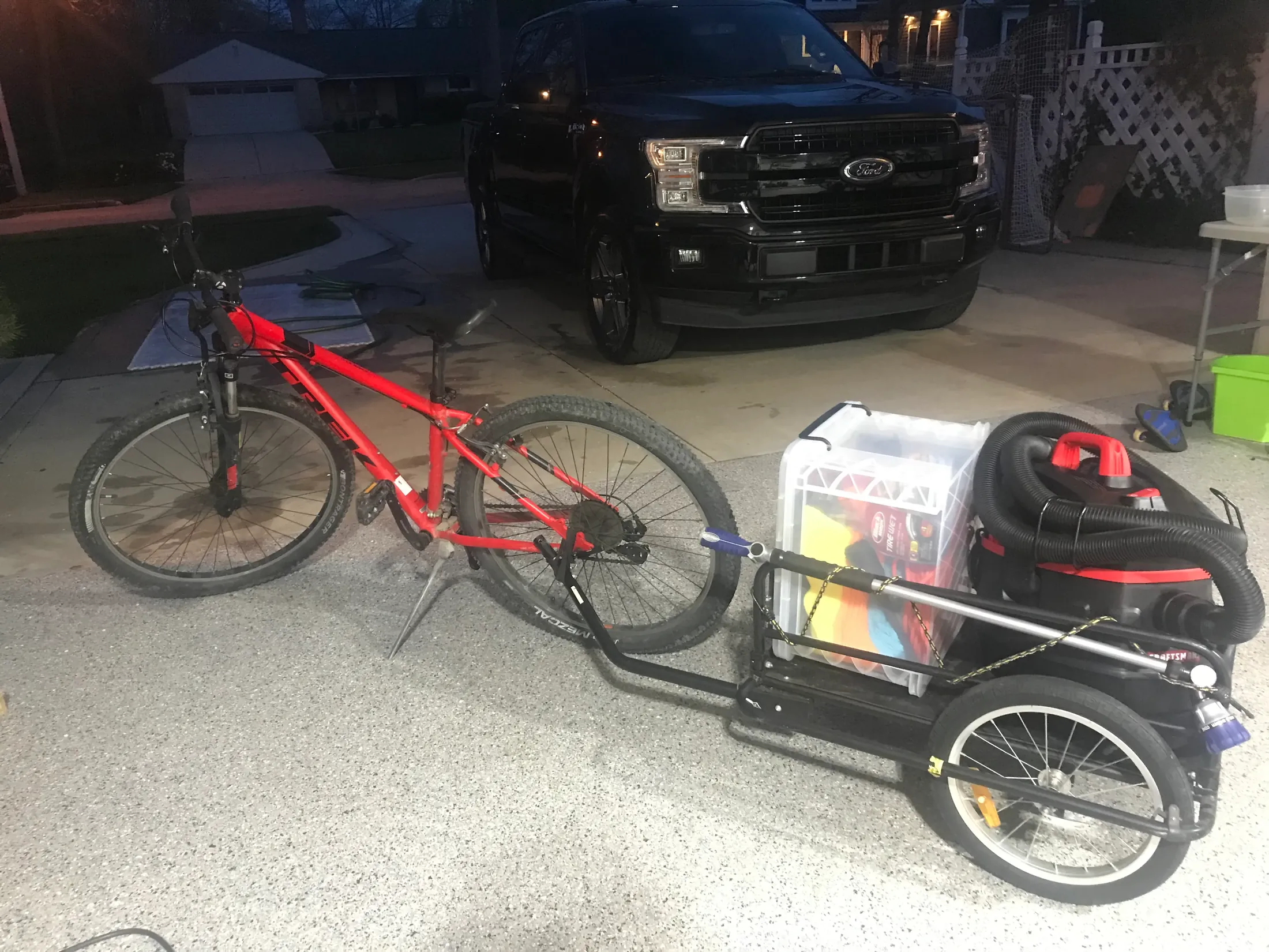 Red bike with trailer - how Just The Details started
